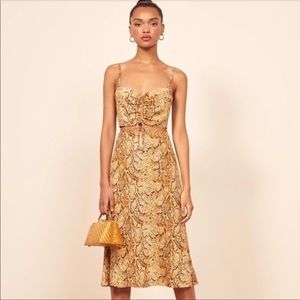 Good condition Reformation Ali snake print skirt size 2